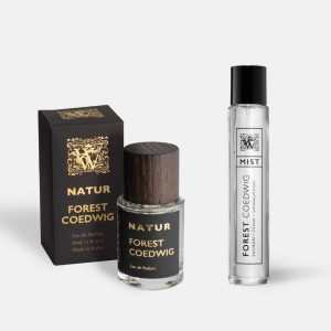A Wales Perfumery Natur Forest Coedwig 30ml Eau de Parfum in a clear glass bottle with a dark wooden cap, alongside its black and gold gift box, and a slim Forest Coedwig Mist featuring saffron, cedar and sandalwood, on a light grey background.