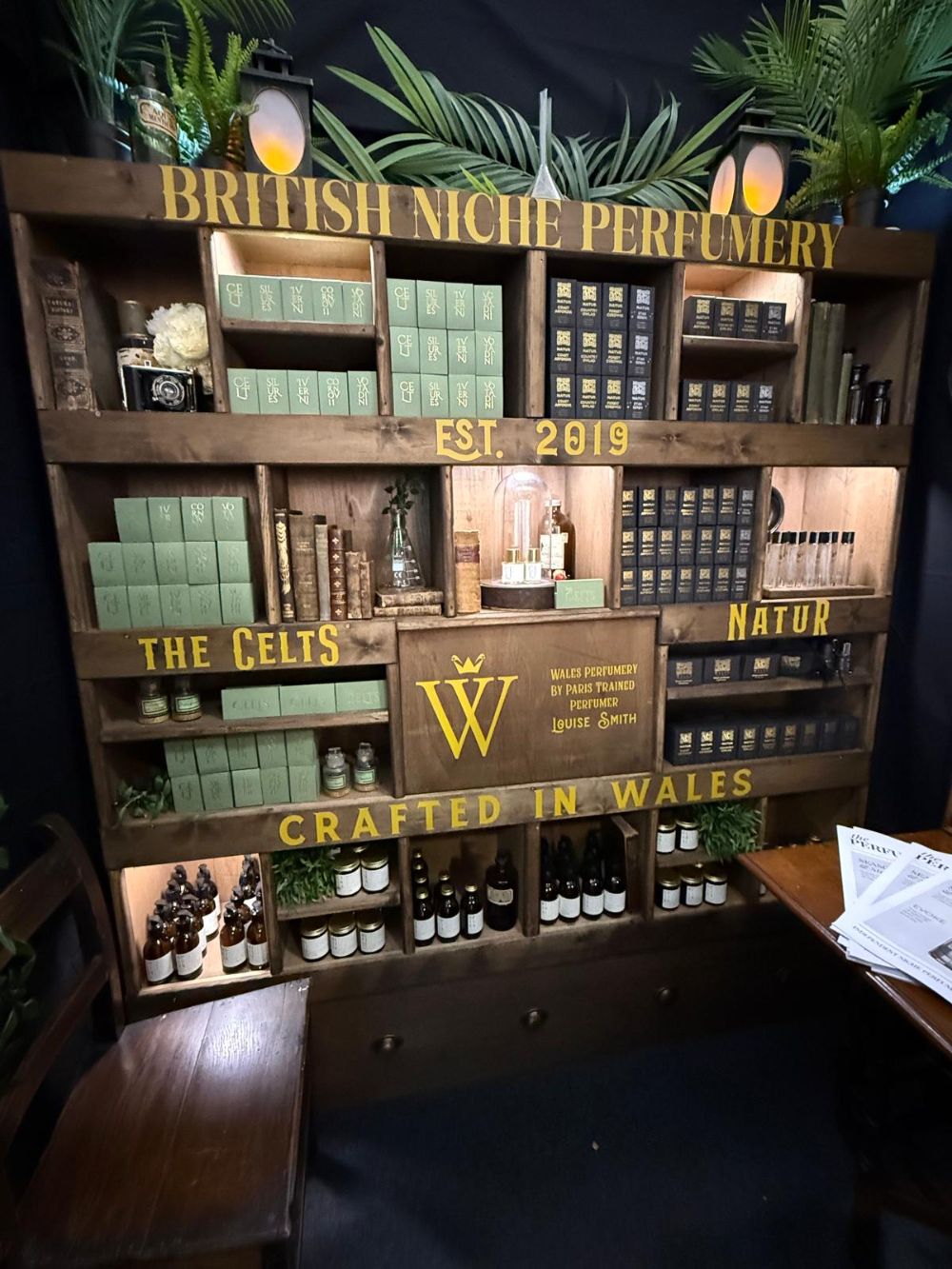 Wales Perfumery's stand at Spring Fair 2026, shelves filled with boxes and bottles of perfume