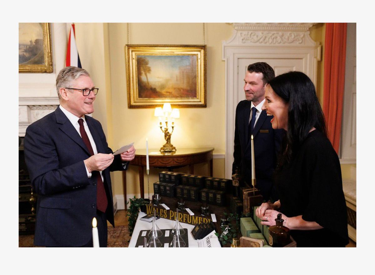 Louise Smith of Wales Perfumery presenting a fragrance scent card to Sir Keir Starmer at the St David's Day Reception inside 10 Downing Street, February 2026