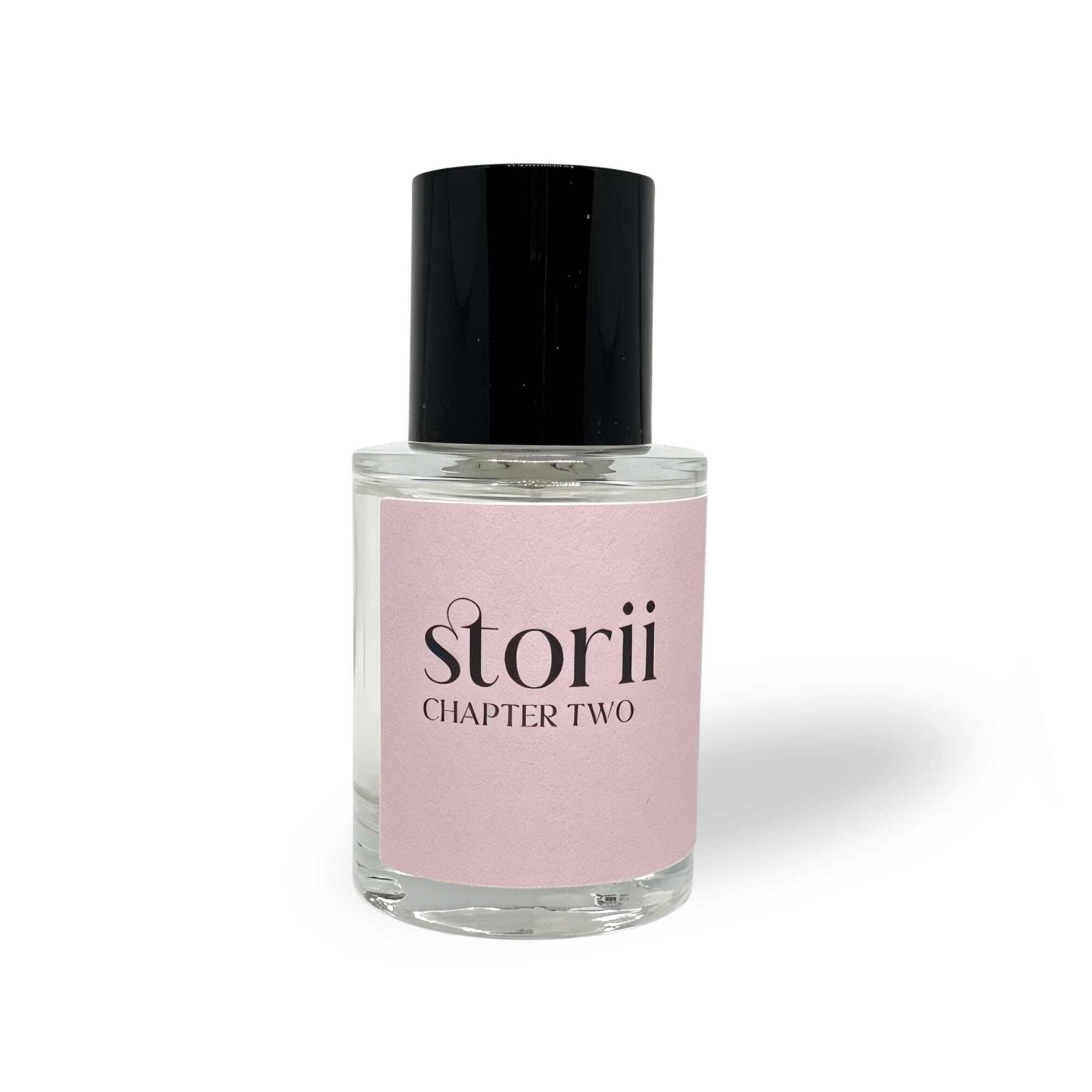 Storii Chapter Two 30ml perfume bottle, pale pink label, tall black cap, standing upright on a white background
